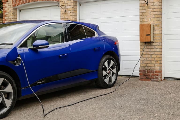 Electric vehicle charging in a residential garage
